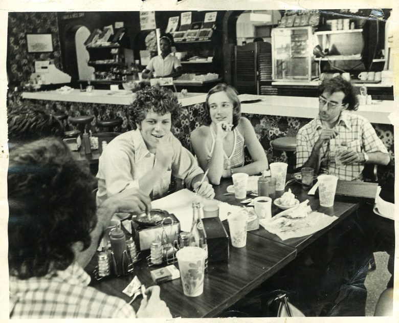 Alan Leveritt (left), Margaret Arnold (now known as Mara Leveritt) and other Arkansas Times staffers meet at The Shack.