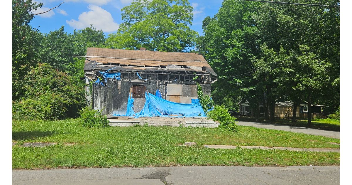 A vacant and decrepit house in the Central High Neighborhood Historic District, one of many.